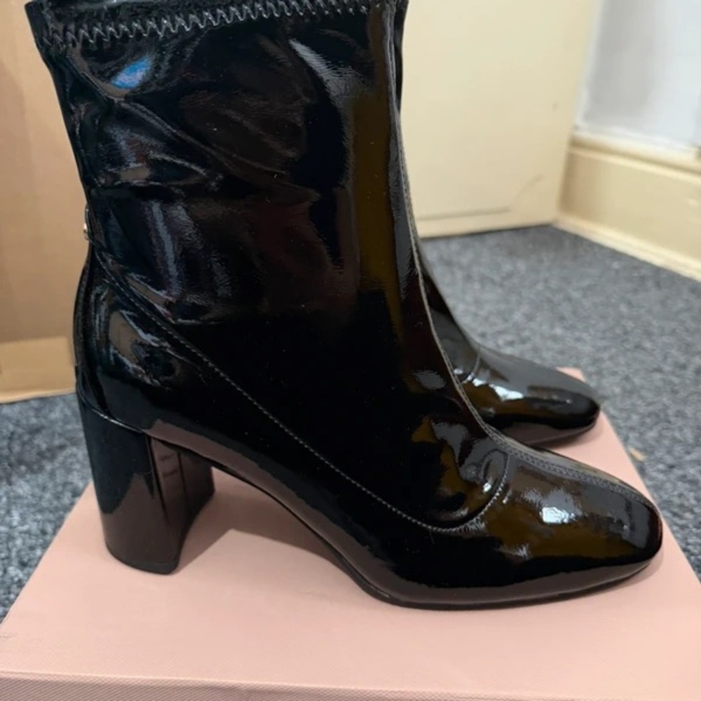 Elegant Black Patent Leather Heeled Boots